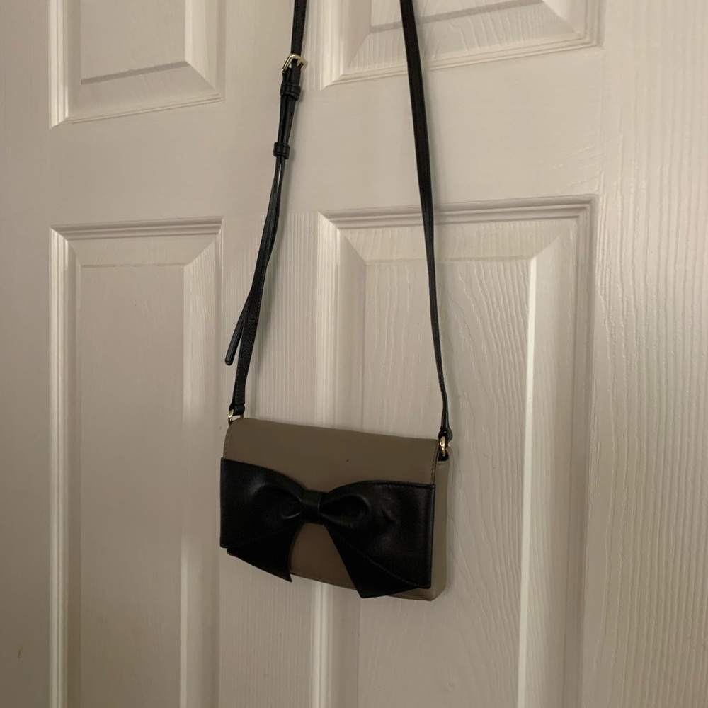 Kate Spade mini bag with attractive bow.